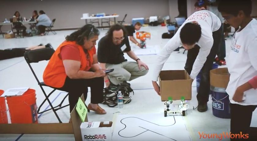 oliver and chaitanya with their robot